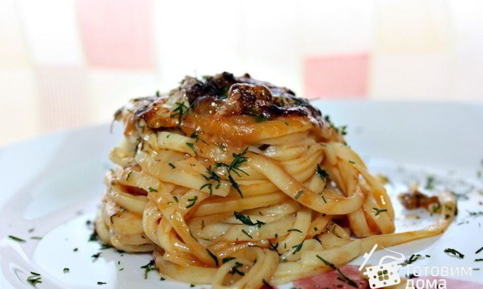 Рецепт запеченные под сыром гнезда-спагетти с фаршем и грибами