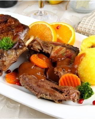 Кролик с апельсином и оливками