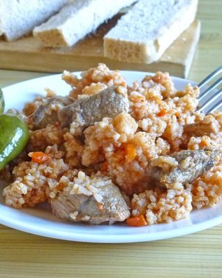 Плов в кастрюле со свининой