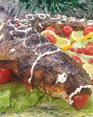 Белый амур запеченный в духовке фаршированный