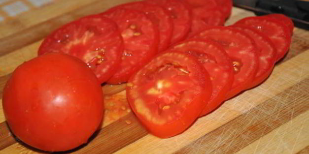 рыба путассу запеченная с лимоном и томатами