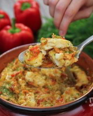 Рыба, тушенная с овощами