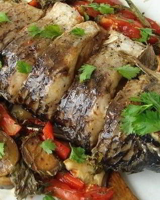 Рыба, запеченная в духовке с овощами