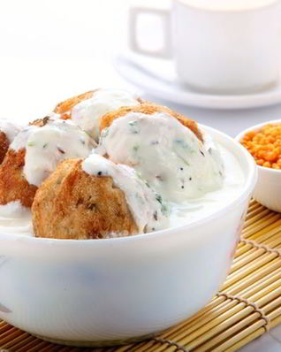 Сырники с маково-сметанным соусом