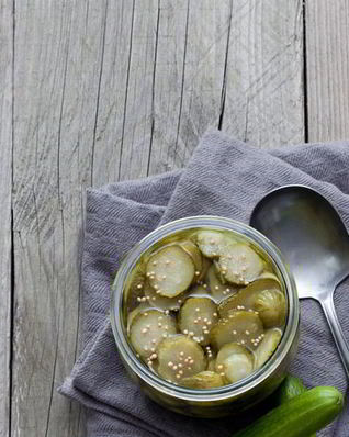 Заготовка вкусных огурцов с чесноком на зиму