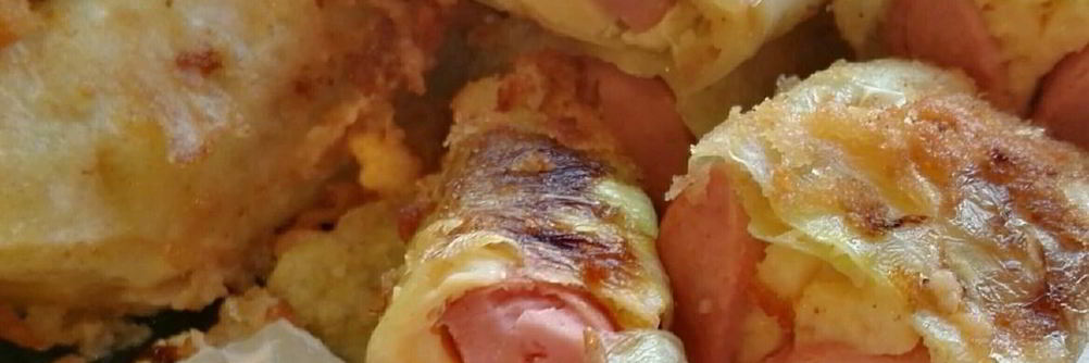 Сосиски с сыром в капусте