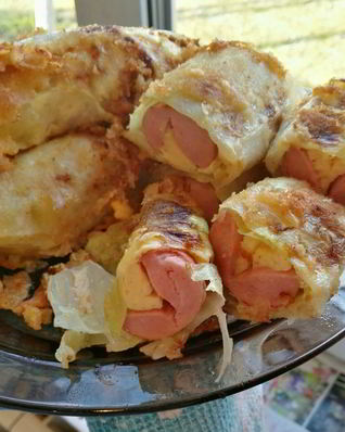 Сосиски с сыром в капусте